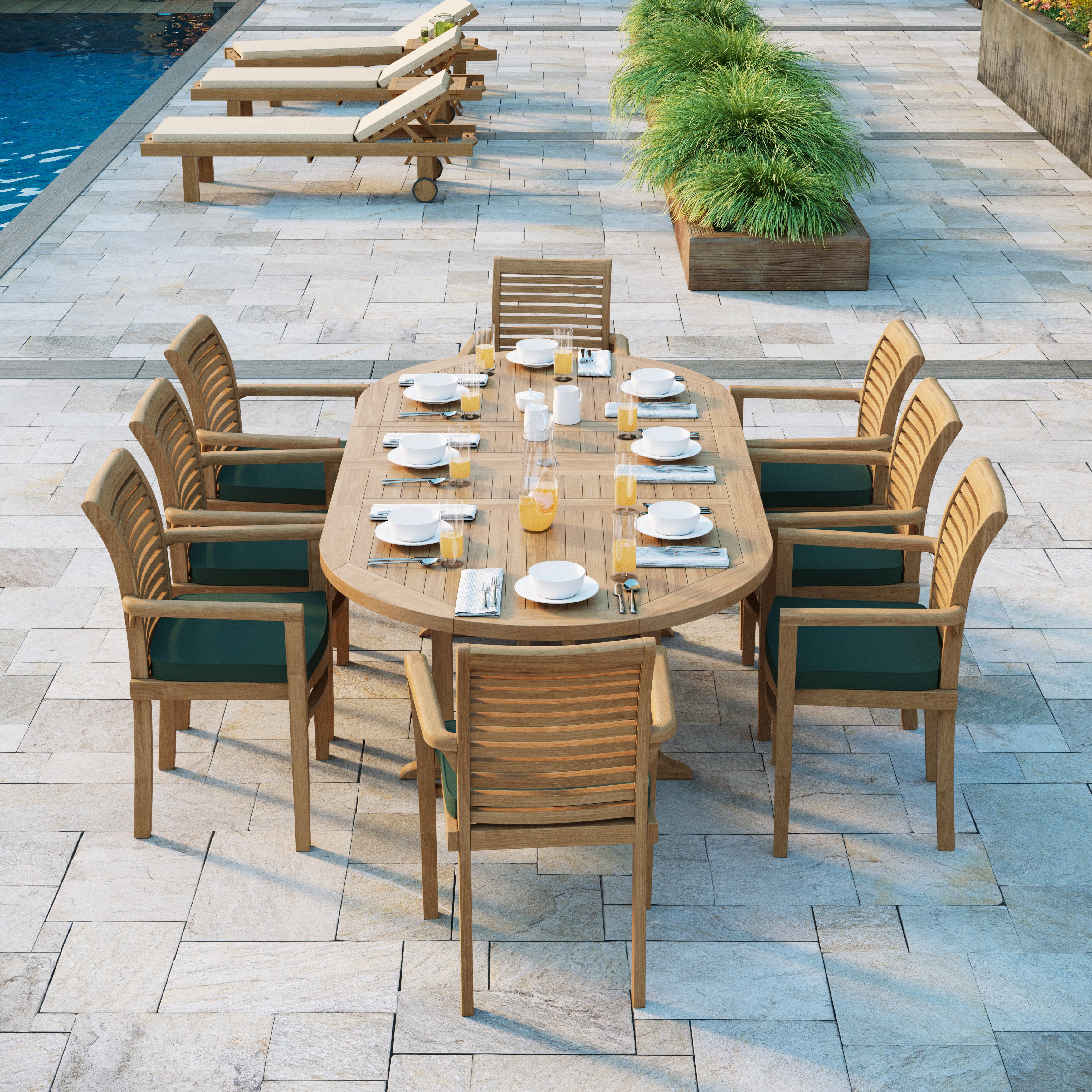 180-240cm oval extending teak table with 8 stacking chairs and cushions