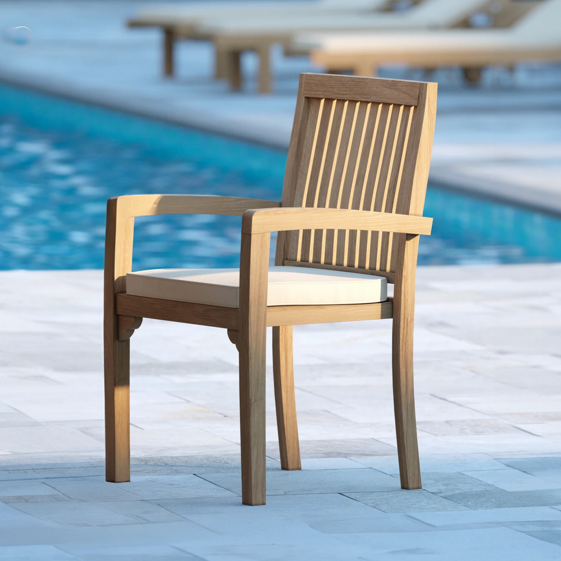 Four Henley Teak Stacking Chairs with Cushions.