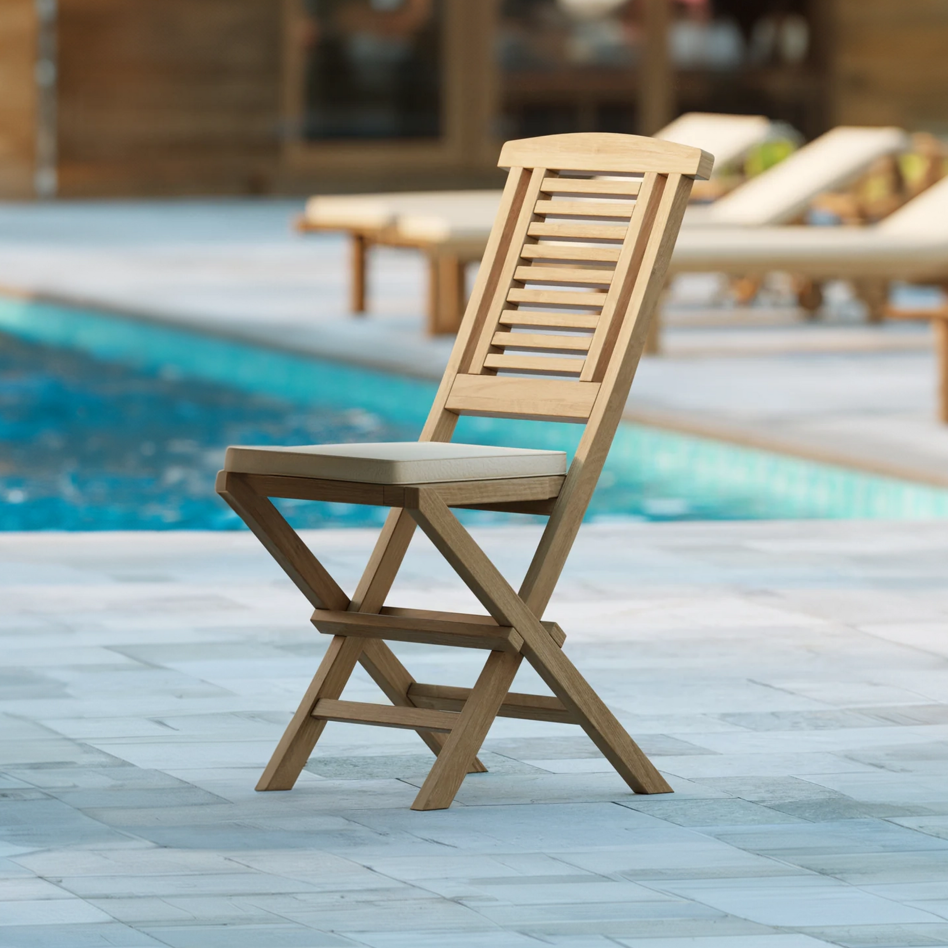 Two Hampton Teak Folding Chairs with Cushions.